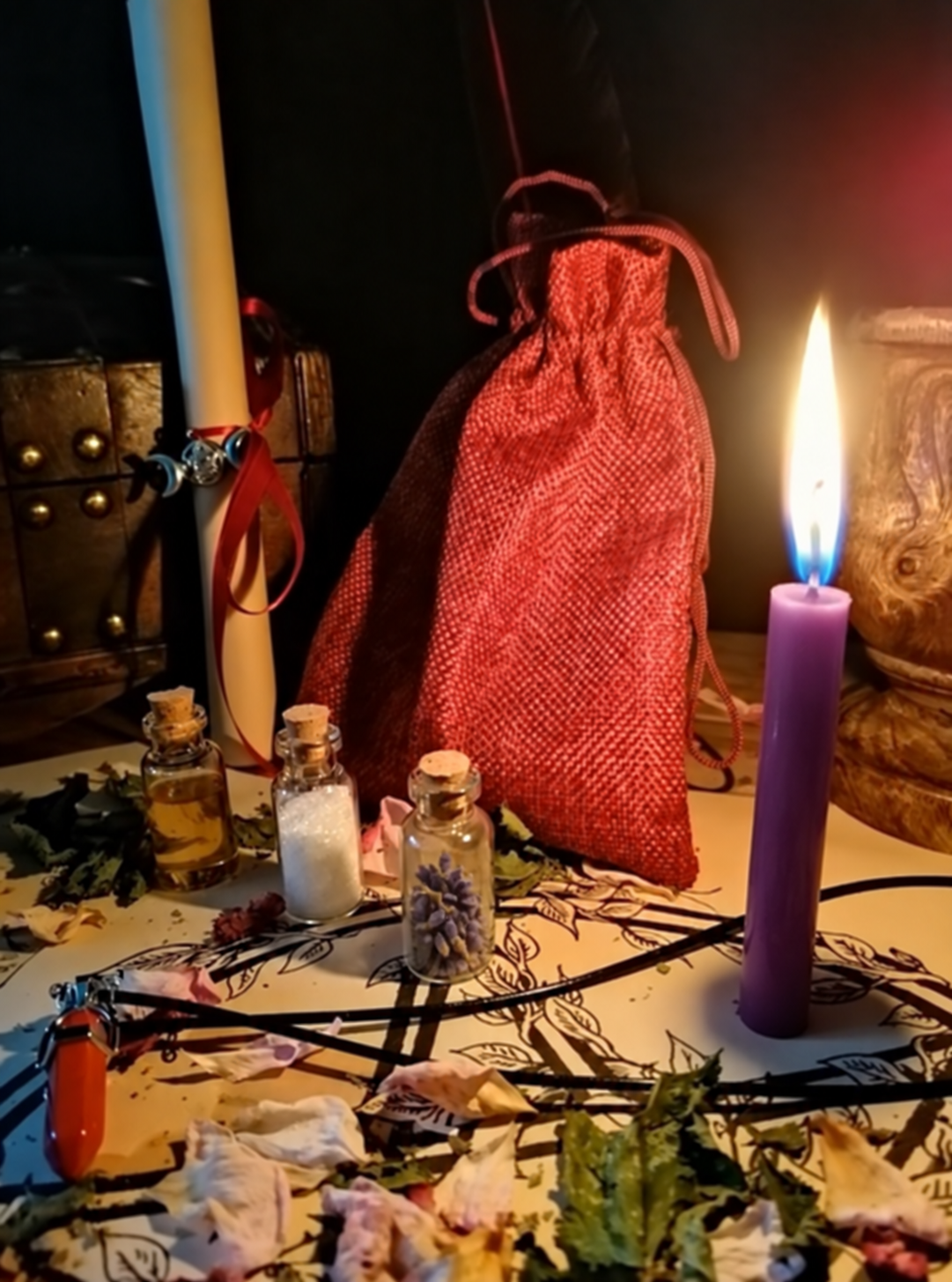 Illustrative scene for Custom Spell with a candle, dried plants and small glass vials, adapted from the shared ritual setting.